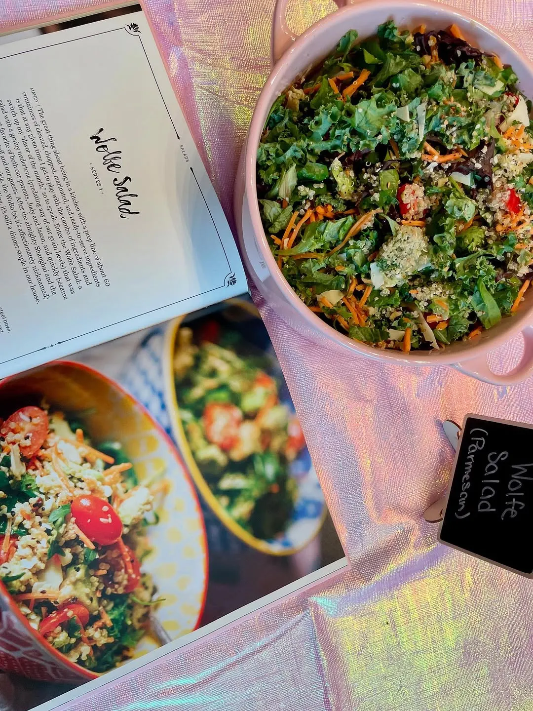A member's Wolfe Salad served beside the open Mandy's Gourmet Salads cookbook.